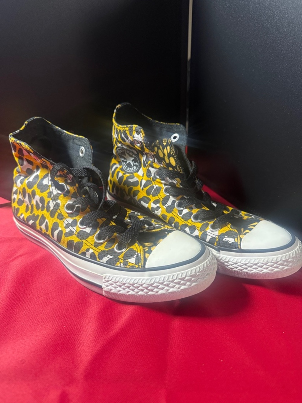 Converse Yellow and Black Leopard Print High Top Sneakers